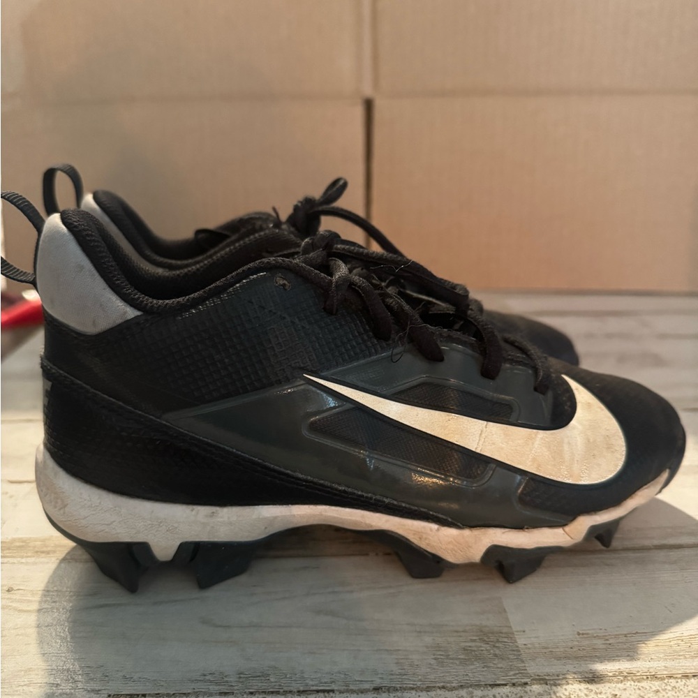 Nike Black and White Sports Cleats Alpha Menace
